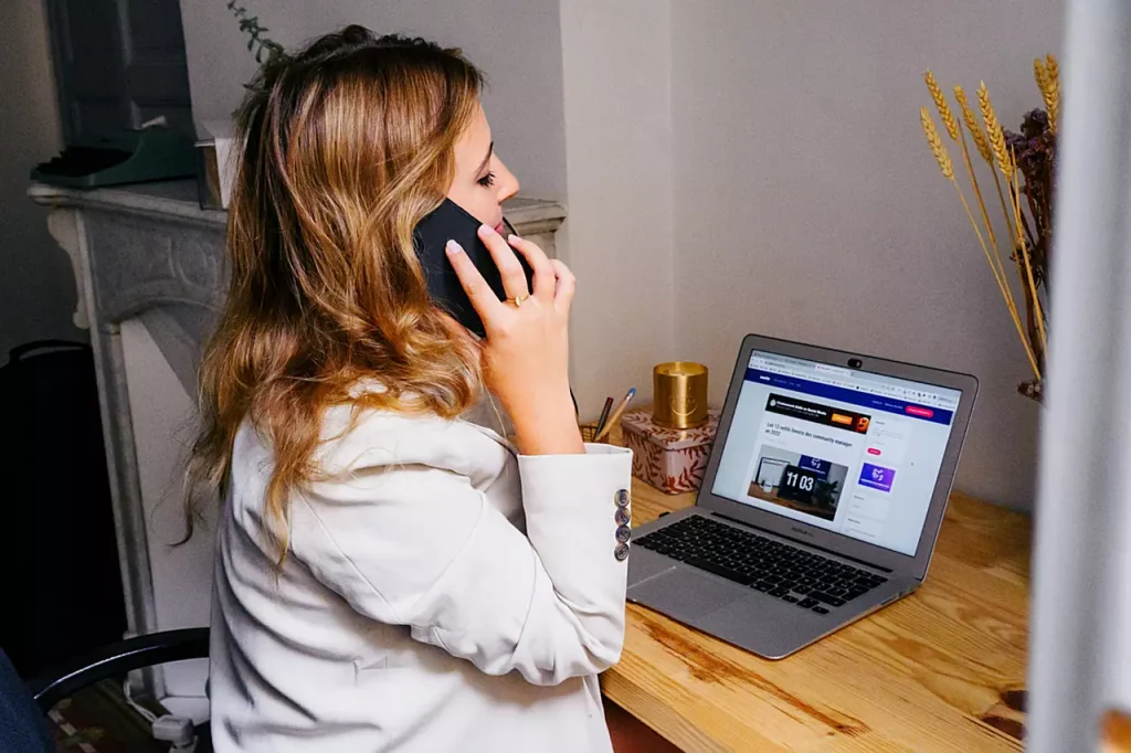 contact VantEdge Growth Marketing client calling with laptop