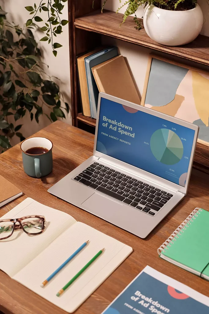 laptop and report for work on real estate social media marketing